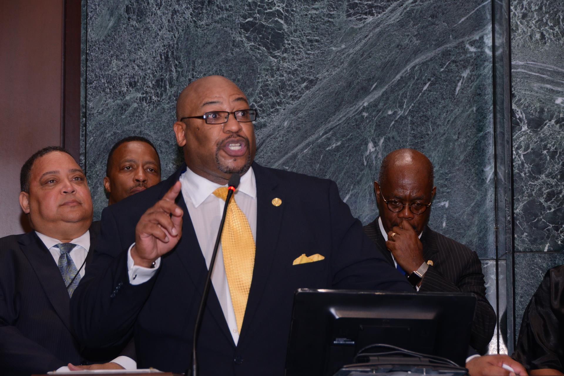 Clinton Rucker speaks in to the full council